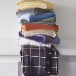 Home Expressions Velvet Plush Solid Throws only $7.99!