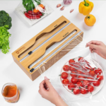 Bamboo Kitchen Foil and Plastic Wrap Organizer with Cutter $11.49 After Coupon (Reg. $22.97)