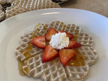 1-ingredient soaked quinoa waffles with strawberries on top
