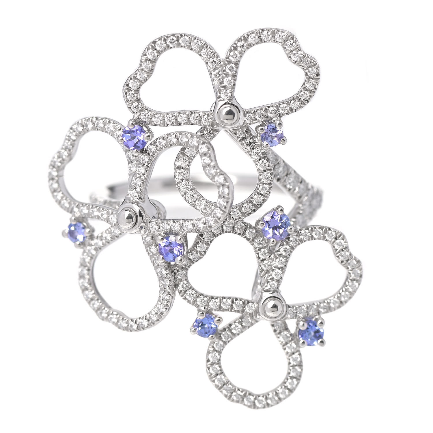 this is a product image by FASHIONPHILE of a TIFFANY Platinum Diamond Tanzanite Paper Flowers Open Cluster Ring 50 in size 5.5