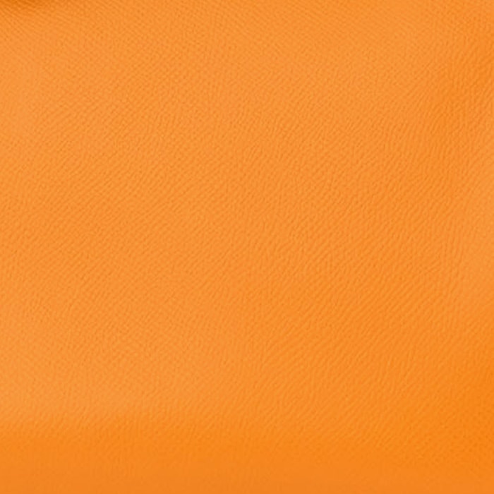this is a close up swatch image by fashionphile of the hermes jaune d'or color on epsom leather