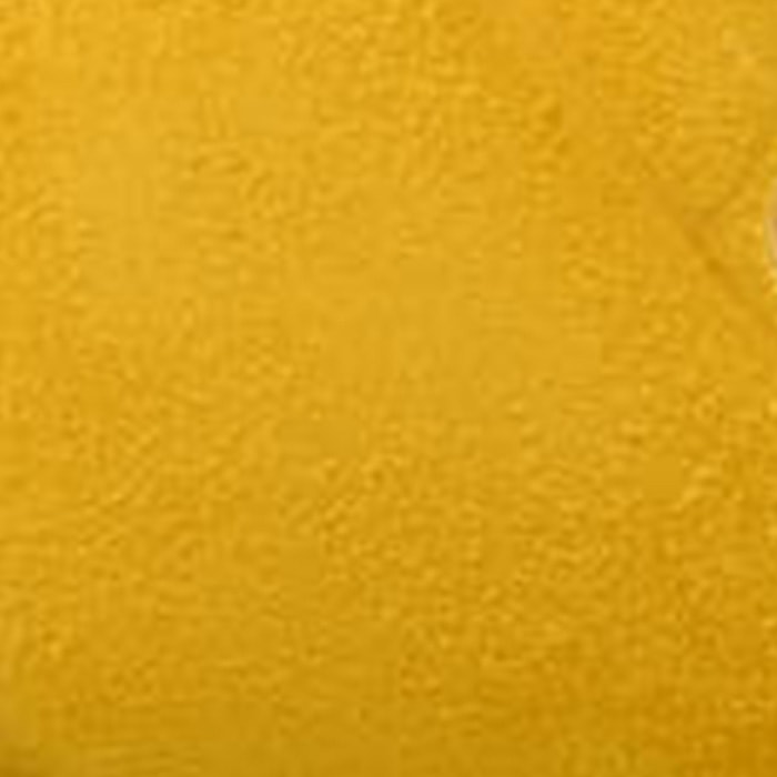 this is a close up swatch image by fashionphile of the hermes jaune sable color on suede leather