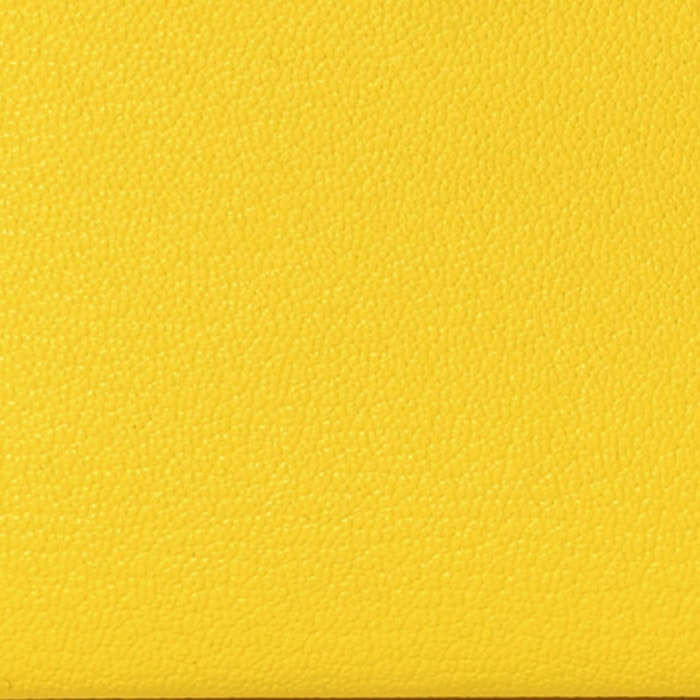 this is a close up swatch image by fashionphile of the hermes jaune citron color in chevre mysore