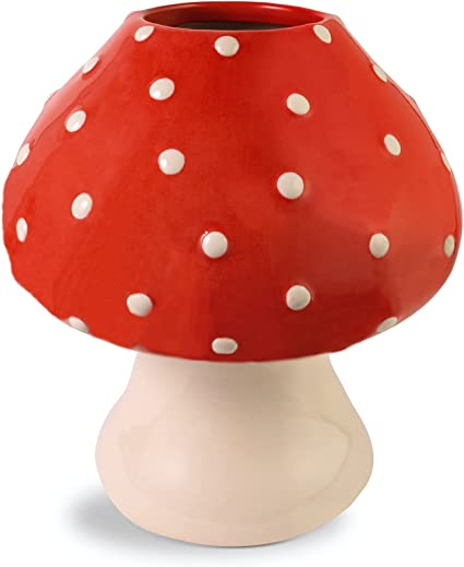 a vase shaped like a red musrhoom