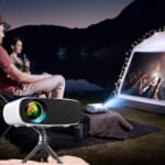 HD Mini Projector 8000L 1080p with Tripod and Carry Bag $62.98 After Coupon (Reg. $159.98) + Free Shipping
