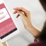 Woman using digital coupon