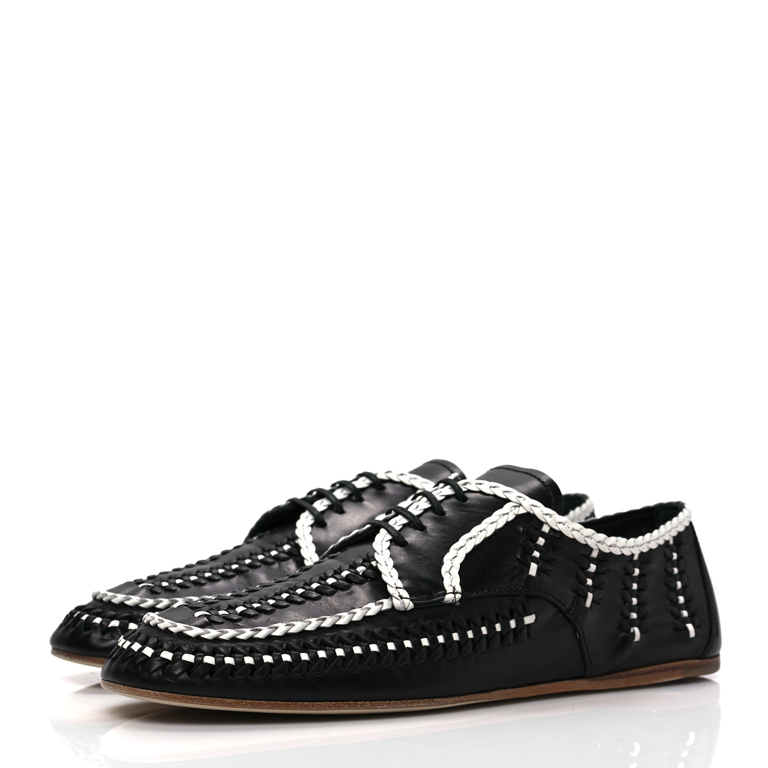 side view image of PRADA Calfskin Woven Loafers in the colors Black and White by FASHIONPHILE