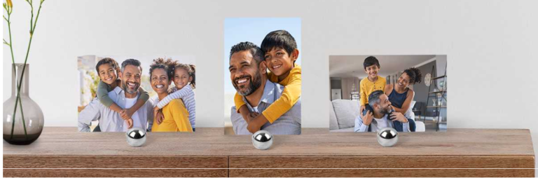 photo prints of family on a shelf
