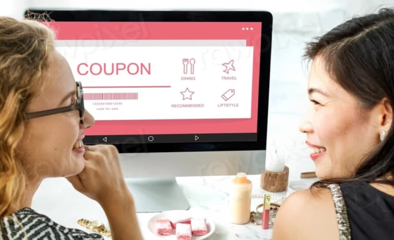 Women discussing digital coupons