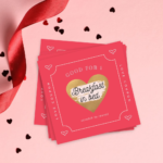 Photo of a scratch-off love coupon revealing the text Breakfast in Bed