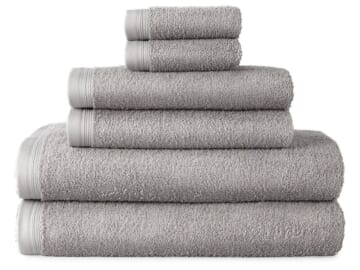 Home Expressions Solid and Stripe Towels From $5.60 + free shipping w/ $75