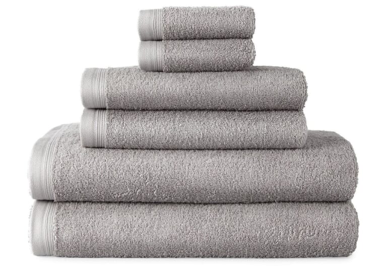 Home Expressions Solid and Stripe Towels From $5.60 + free shipping w/ $75