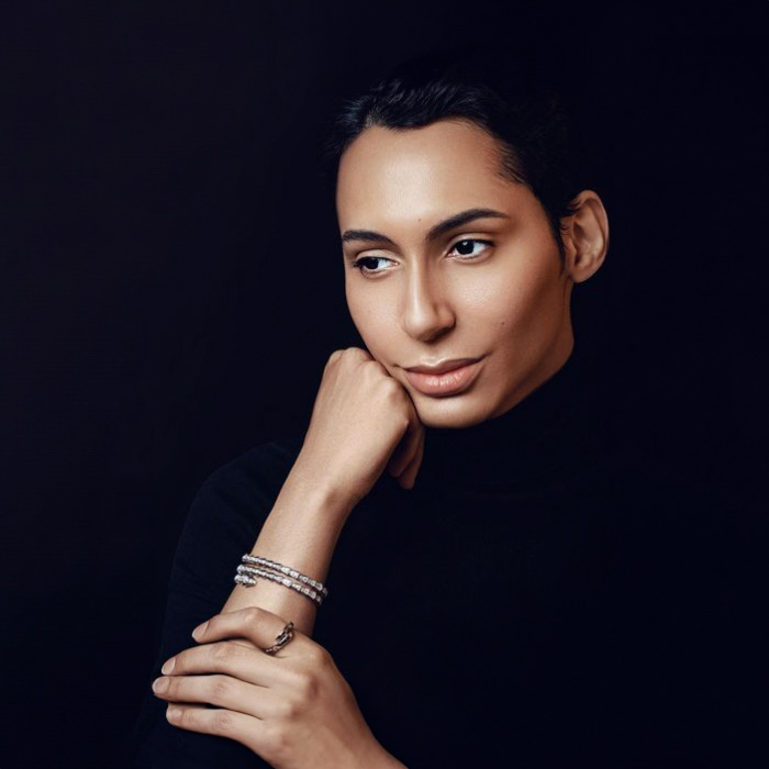 charles gross wearing the bulgari serpenti viper bracelet, a double layered bangle that wraps around coiling the wrist and set with pave diamonds